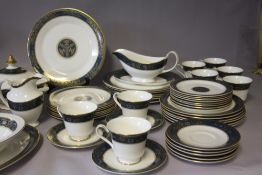 A LARGE COLLECTION OF ROYAL DOULTON 'CARLYLE' PATTERN TEA AND DINNERWARE, comprising 8 cups, 8