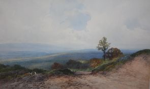 FREDERICK JOHN WIDGERY (1861-1942). A hillside landscape with a figure in the foreground, signed