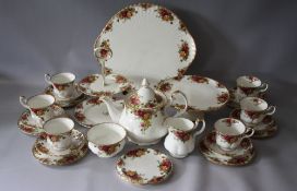A SELECTION OF ROYAL ALBERT OLD COUNTRY ROSES FINE BONE CHINA TEAWARE, comprising a Tea pot, sugar
