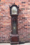 A GEORGIAN EIGHT BELL STRIKE LONGCASE CLOCK BY JAMES GRAHAM - LONDON, the ebonised mahogany case