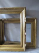 A PAIR OF 19TH CENTURY GOLD FRAMES A/F, with decorative design to outer edge, frame W 11 cm, rebates