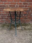 A MID 20TH CENTURY METAL GARDEN TABLE WITH LATER WOODEN TOP, having hairpin style legs with
