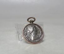 A LUCILLA SILVER DENARIUS COIN AD 164-182, the reverse depicting Juno standing facing left, set in