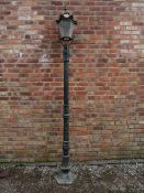 A CAST IRON PROMENADE / STREET LAMP, hexagonal base with floral embellishments to column,