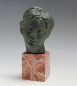 A SMALL BRONZE BUST ON MARBLE BASE, signed Yuki, H 15 cm