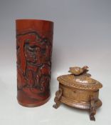 A LARGE ORIENTAL CARVED BAMBOO BRUSH POT A/F, H 28 cm, together with a 20th century carved wooden