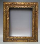 A LATE 19TH / EARLY 20TH CENTURY DECORATIVE GOLD FRAME, frame W 9 cm, rebate 43 x 35 cm