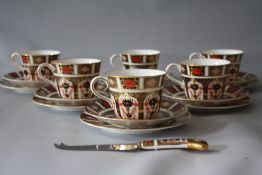 A SET OF SIX ROYAL CROWN DERBY IMARI PATTERN 1128 TRIOS, all marked as seconds, plate Dia. 16 cm,