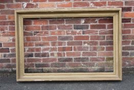 A NINETEENTH CENTURY GOLD FRAME, width of frame 12 cm, rebate 133 x 82 cm