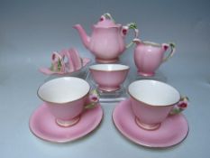 A ROYAL WINTON PEONY PATTERN PORCELAIN BREAKFAST SET, comprising teapot, milk jug, sugar bowl, two