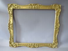 A 19TH CENTURY GOLD SWEPT FRAME, with some restoration, frame W 7 cm, rebate 62 x 52 cm