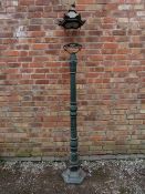 A CAST IRON PROMENADE / STREET LAMP, hexagonal base with floral embellishments to column,