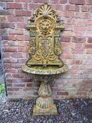 A VICTORIAN STYLE CAST METAL WALL FOUNTAIN WITH LION DETAIL, approx W 75.5 cm, overall H 166