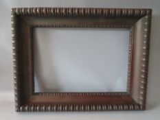 A 19TH CENTURY DECORATIVE CARVED OAK FRAME, frame W 9 cm, rebate 54 x 37 cm