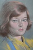 WY?? (XX). A head and shoulder portrait study of a young woman, signed lower left, pastel on