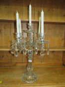 A LARGE MODERN DECORATIVE GLASS FIVE BRANCH CANDELABRA, WITH SWIRLED EFFECT CANDLE HOLDERS AND THREE