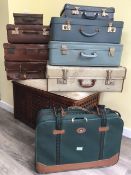 9 VINTAGE SUITCASES, OF VARIOUS SIZES AND AGE