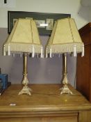 A PAIR OF CONTEMPORARY GILT TABLE LAMPS WITH SHADES