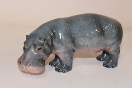 A BESWICK HIPPOPOTAMUS FIGURE