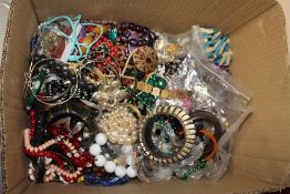 A LARGE BOX OF COSTUME JEWELLERY