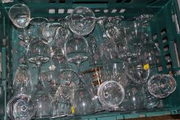 A TRAY OF DRINKING GLASSES TO INCLUDE CUT GLASS EXAMPLES