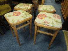 A SET OF FOUR RETRO KITCHEN STOOLS