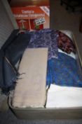 A SUITCASE OF VINTAGE TEXTILES AND FABRIC