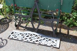 A PAIR OF CAST BENCH ENDS PLUS BACK PIECE - A/F