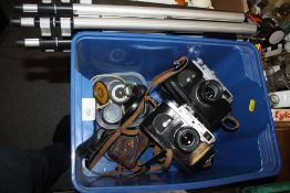 TWO VINTAGE RUSSIAN ZORKI-4 CAMERAS AND ACCESSORIES TO INCLUDE A TRIPOD TOGETHER WITH A WWI BRASS