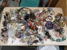 A BOX OF ASSORTED COSTUME JEWELLERY