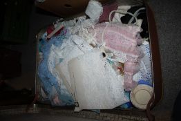 A SUITCASE OF SEWING ACCESSORIES