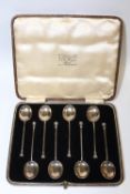A CASED SET OF EIGHT HALLMARKED SILVER SEAL TOP COFFEE SPOONS