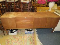 A RETRO 'A.H. McINTOSH & Co Ltd' TEAK SIDEBOARD IN NEED OF RESTORATION H-81 W-202 CM A/F