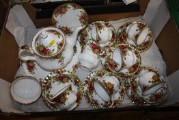 A ROYAL ALBERT OLD COUNTRY ROSES CHINA SIX PERSON TEA SET COMPRISING TEA POT, MILK JUG, SUGAR