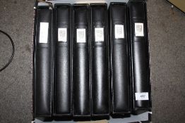 SIX FOLDERS OF MOSTLY MODERN STAMPS