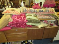A LARGE QUANTITY OF ASSORTED CUSHIONS