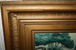 A LARGE ANTIQUE GILT FRAME, with Acanthus moulded detail throughout, with an inset tapestry of a