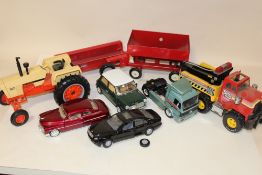 A ERTL 2557 AGRIKING MODEL TRACTOR, A REMCO BIG RIG TOWING TRUCK, TRAILERS AND FOUR OTHER DIECAST