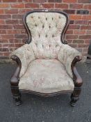 AN ANTIQUE MAHOGANY FRAMED GENTLEMANS ARMCHAIR