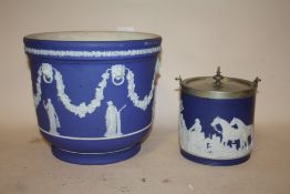 A LARGE WEDGWOOD BLUE DIP JASPERWARE JARDINIERE TOGETHER WITH A SIMILAR CRACKER BARREL DECORATED