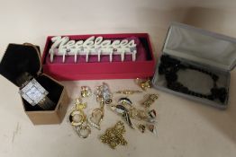 A COLLECTION OF MOSTLY MODERN BROOCHES, TOGETHER WITH A NECKLACE STAND, BOXED WRISTWATCH ETC.