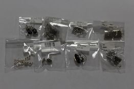 EIGHT PAIRS OF PACKAGED SILVER EARRINGS
