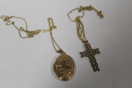 A CELTIC STYLE CROSS PENDANT ON 9 CT GOLD CHAIN TOGETHER WITH A YELLOW METAL LOCKET ON CHAIN
