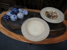 A CONTEMPORARY TABLE CENTREPIECE BOWL AND STAND WITH POLISHED STONES, TOGETHER WITH A GLASS BOWL