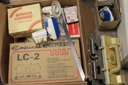 AN EMPIRIAL KNITMASTER F370K TOGETHER WITH A ZIPPY PLUS KNITTING MACHINE WITH STAND AND BOX OF