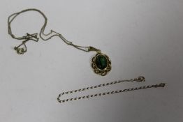 A 9CT GOLD PENDANT SET WITH A LARGE PERIDOT STYLE GREEN STONE ON RG CHAIN, TOGETHER WITH A 9CT