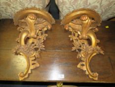 A PAIR OF GILT WALL BRACKETS, H ?? cm (2)