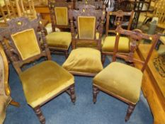A SET OF FOUR EDWARDIAN CARVED OAK DINING CHAIRS AND TWO OTHER CHAIRS (6)