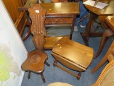 A CARVED OAK CREDENCE TYPE TABLE, SPINNING CHAIR AND A DROPLEAF TABLE (3)