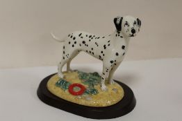 A ROYAL DOULTON UTILITY DOG COLLECTION DALMATION FIGURE ON WOODEN PLINTH